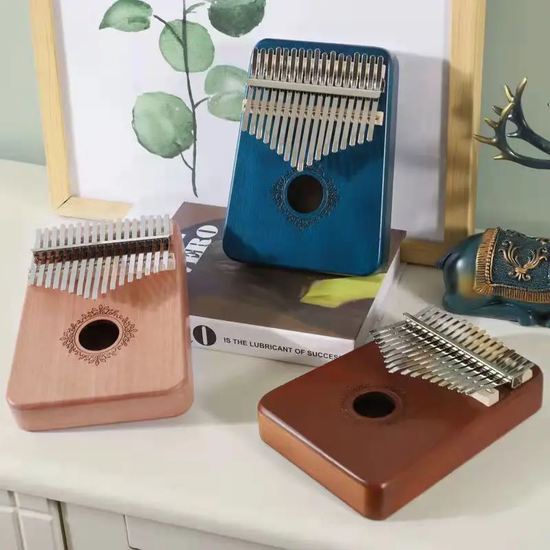 Kalimba 17 клавиш большой палец пианино музыкальная шкатулка Высокое качество деревянный корпус творческий Музыкальный телефон красивый звук ...
Kalimba 17 клавиш большой палец пианино музыкальная шкатулка Высокое качество деревянный корпус творческий Музыкальный телефон красивый звук ...