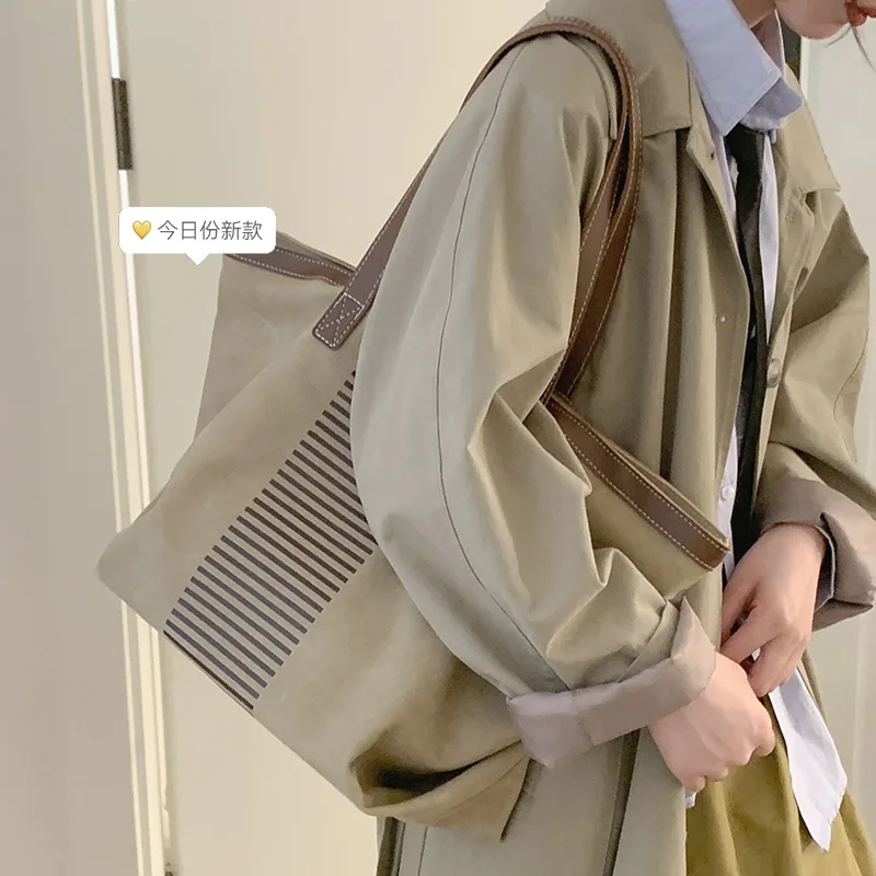 Large Capacity Canvas Bag Women 2022 New Fashion Commuter Tote Bag College Students Shoulder Bag Female Shopper Buckets Bag
Large Capacity Canvas Bag Women 2022 New Fashion Commuter Tote Bag College Students Shoulder Bag Female Shopper Buckets Bag