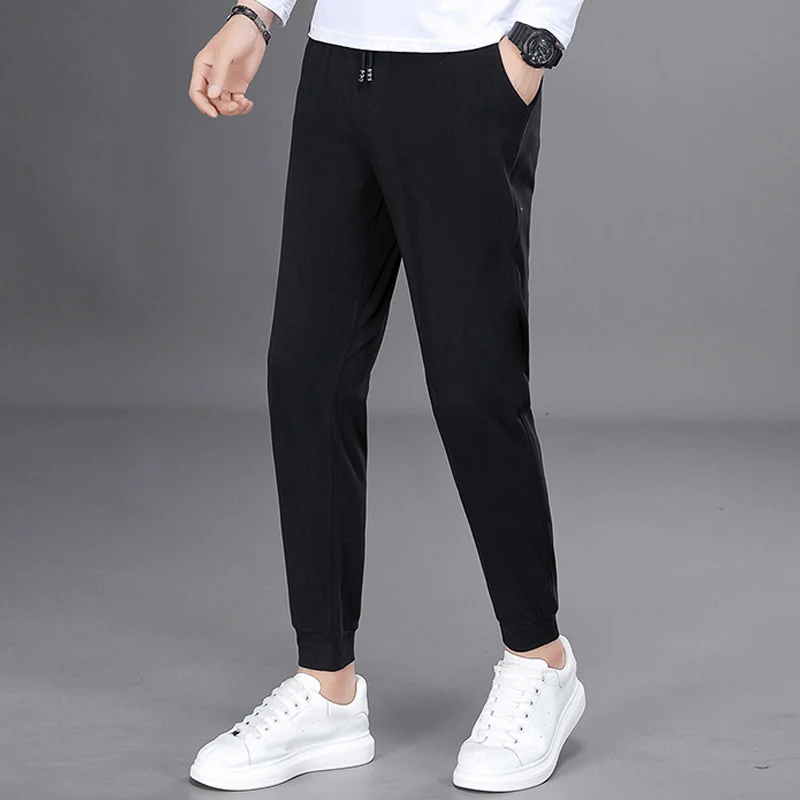 Spring Autumn Black Jogging Pants Men Harajuku Fashion Solid Drawstring Harem Pants Men Long Trousers Elastic Waist Sweatpants
Spring Autumn Black Jogging Pants Men Harajuku Fashion Solid Drawstring Harem Pants Men Long Trousers Elastic Waist Sweatpants