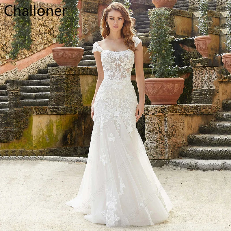 Challoner Classic Mermaid Wedding Dresses New Sexy Buttons Backless Appliques Cap Sleeves Sweep Train Ivory Beach Bridal Gowns
Challoner Classic Mermaid Wedding Dresses New Sexy Buttons Backless Appliques Cap Sleeves Sweep Train Ivory Beach Bridal Gowns