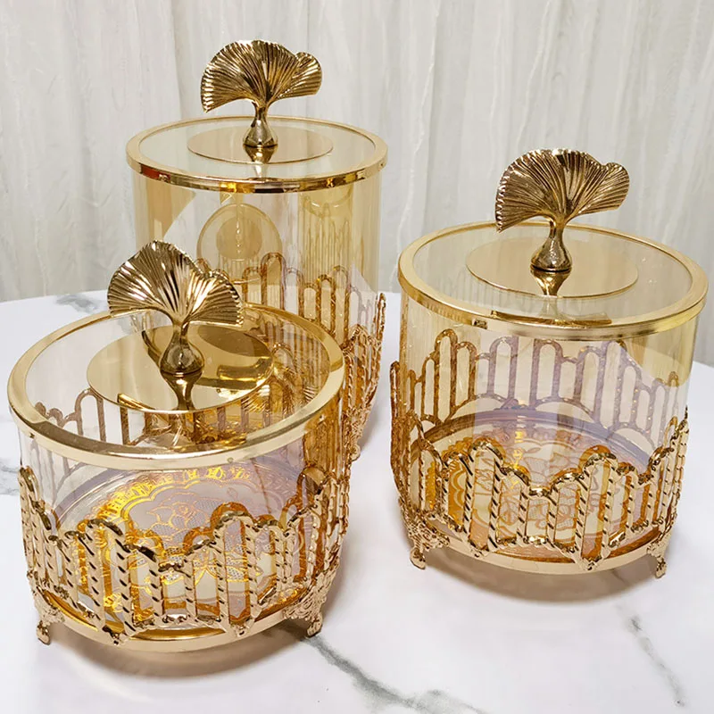 Gold Plated Candy Jar Transparent Glass Jewelry Cosmetics Box Gold Hollow Out Fruit Nut Sundry Storage Bottle Wedding Decoration
Gold Plated Candy Jar Transparent Glass Jewelry Cosmetics Box Gold Hollow Out Fruit Nut Sundry Storage Bottle Wedding Decoration