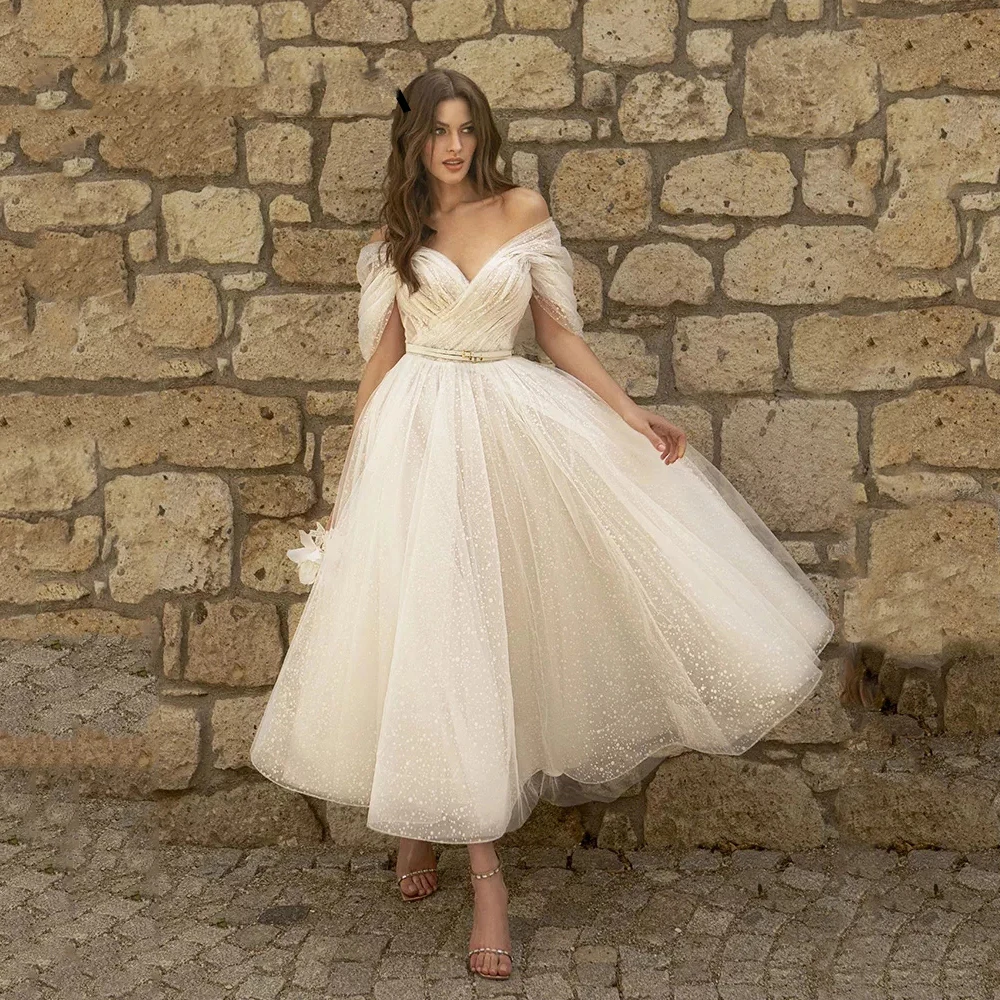 Simple Glittter Short Wedding Dress Elegant Off Shoulder Sweetheaart Point Net Tull Bridal Gown Tea-Length Vestidos De Novia
Simple Glittter Short Wedding Dress Elegant Off Shoulder Sweetheaart Point Net Tull Bridal Gown Tea-Length Vestidos De Novia