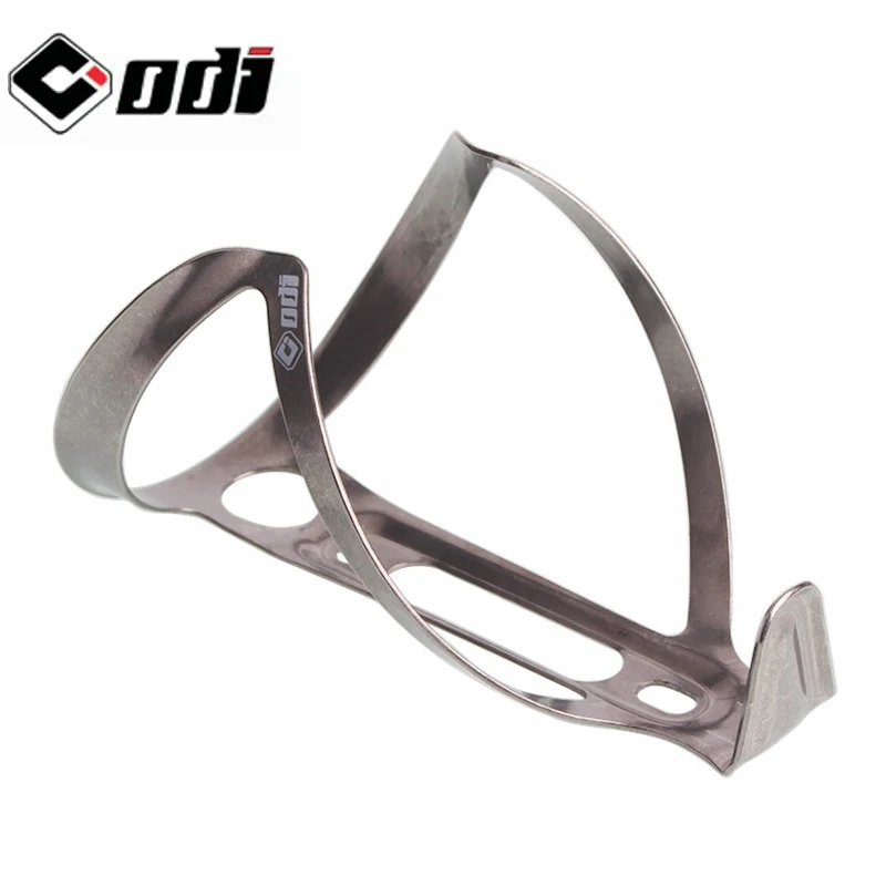 ODI Bicycle Water Bottle Holder Ultralight Titanium Alloy Bike Water Bottle Cage Durable MTB Bike Cup Holder Cycling Equipment 
ODI Bicycle Water Bottle Holder Ultralight Titanium Alloy Bike Water Bottle Cage Durable MTB Bike Cup Holder Cycling Equipment