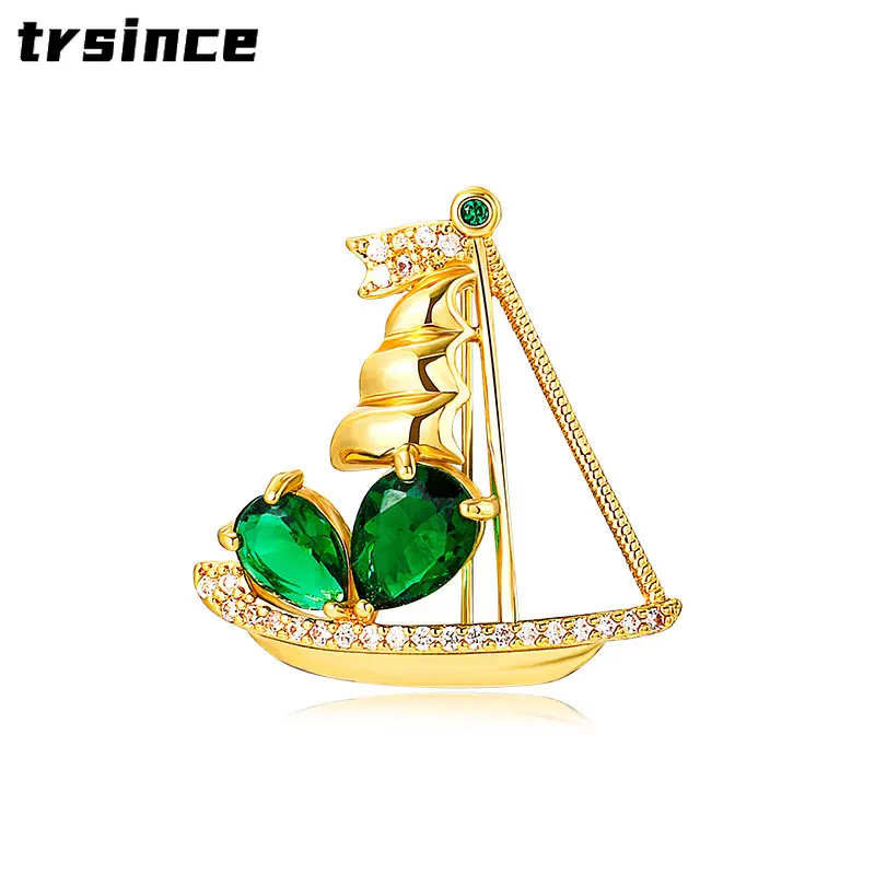 

Gold Color Sailing Boat Copper Inlaid Zircon Green Crystal Sailboat Brooch Simple Badges for Men and Women Rhinestone Jewelry