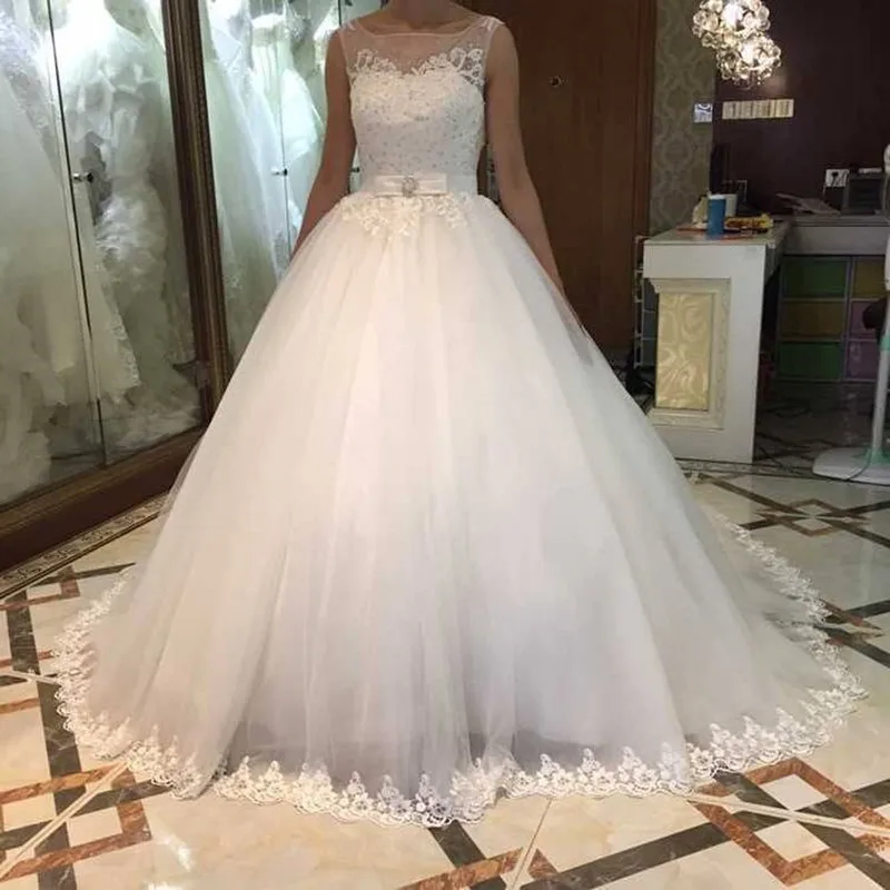 Classic Appliques Beaded Wedding Dresses Sweep Train Open Back Plus Size Vestidos De Noiva A-Line Bridal Gowns with Bow
Classic Appliques Beaded Wedding Dresses Sweep Train Open Back Plus Size Vestidos De Noiva A-Line Bridal Gowns with Bow