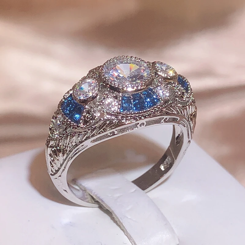New Fashion Woman Man Party Wedding Gift Luxury Oval White Blue Topaz Zircon 18KT White Gold Ring 
New Fashion Woman Man Party Wedding Gift Luxury Oval White Blue Topaz Zircon 18KT White Gold Ring