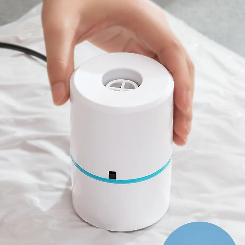Compressed Bag Electric Pump Travel Vacuum Bag Pump Mini Vacuum Sealer Machine Space Saver for Clothes Food Organizer
Compressed Bag Electric Pump Travel Vacuum Bag Pump Mini Vacuum Sealer Machine Space Saver for Clothes Food Organizer