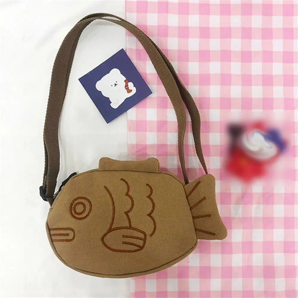 Japanese Style Taiyaki Crossbody Bag Canvas Messenger Bag Cartoon Shoulder Bag Large Capacity Multifunctional Storage Bag
Japanese Style Taiyaki Crossbody Bag Canvas Messenger Bag Cartoon Shoulder Bag Large Capacity Multifunctional Storage Bag
