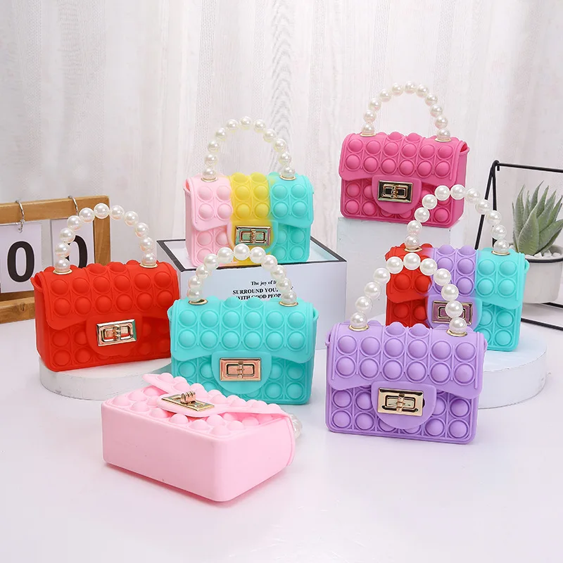 Симпатичная Женская жемчужная сумочка Moji Pop, силиконовые Пузырьковые игрушки-антистресс, Детская сумка для декомпрессии Pop-It Popis
Симпатичная Женская жемчужная сумочка Moji Pop, силиконовые Пузырьковые игрушки-антистресс, Детская сумка для декомпрессии Pop-It Popis
