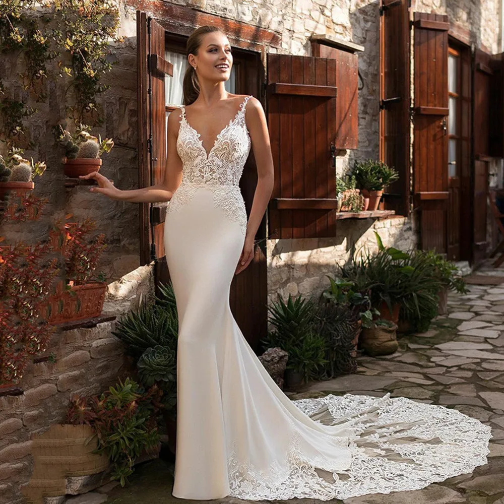 Sexy Deep V-Neck Mermaid Wedding Dress Boho Sleeveless Lace Appliques Bridal Gown Backless Zipper Tulle Train Vestido De Noiva
Sexy Deep V-Neck Mermaid Wedding Dress Boho Sleeveless Lace Appliques Bridal Gown Backless Zipper Tulle Train Vestido De Noiva