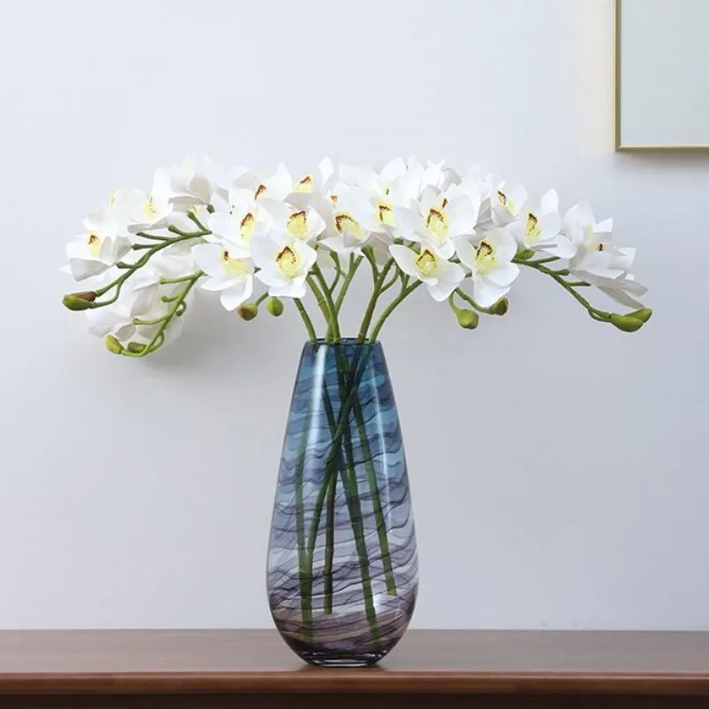 Artificial Cymbidium flower home living room decoration fake flowers wedding decoration bonsai artificial flowers
Artificial Cymbidium flower home living room decoration fake flowers wedding decoration bonsai artificial flowers