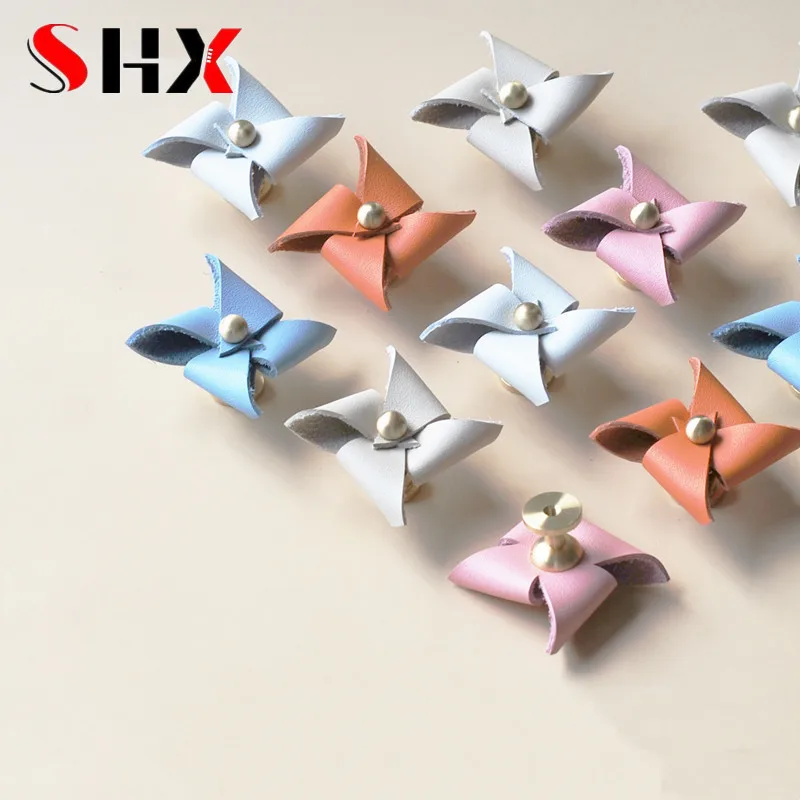Nordic Furniture Drawer Knob Children's Room Cupboard Cabinet Brass Handle Door Pulls Artificial Windmill Leather Handles
Nordic Furniture Drawer Knob Children's Room Cupboard Cabinet Brass Handle Door Pulls Artificial Windmill Leather Handles