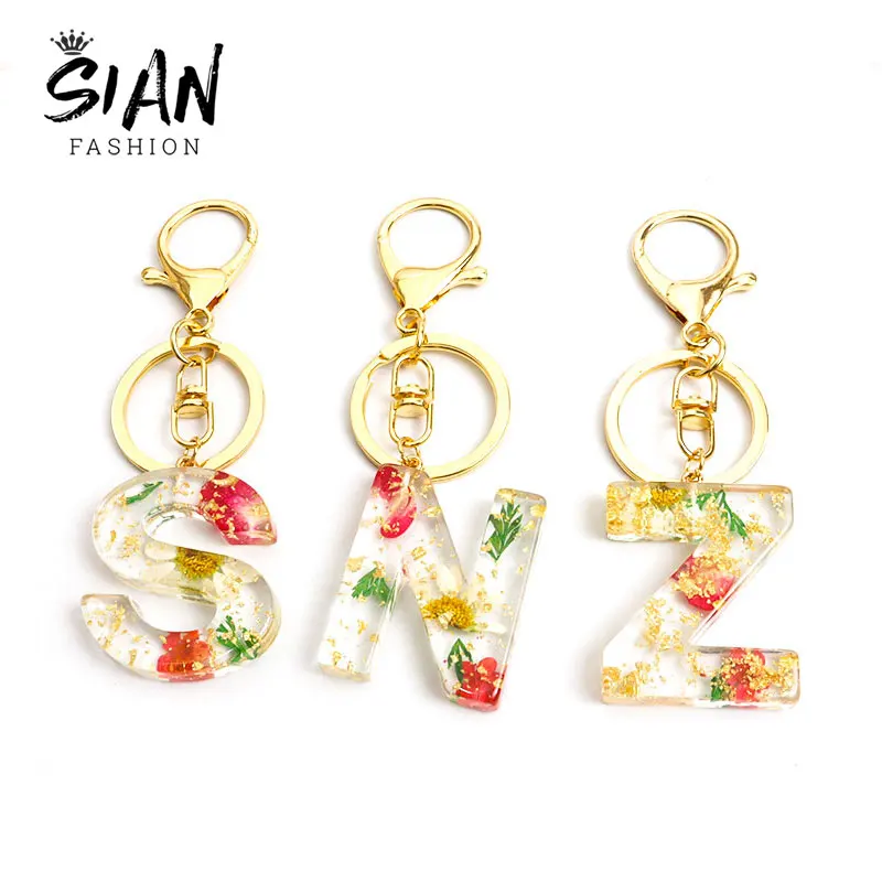 1pcs Real Dried Flower A-Z Letter Keychain Crystal Alphabet Resin Keychains Handbag Purse Key Ring Holder Cute Jewelry for Women 
1pcs Real Dried Flower A-Z Letter Keychain Crystal Alphabet Resin Keychains Handbag Purse Key Ring Holder Cute Jewelry for Women