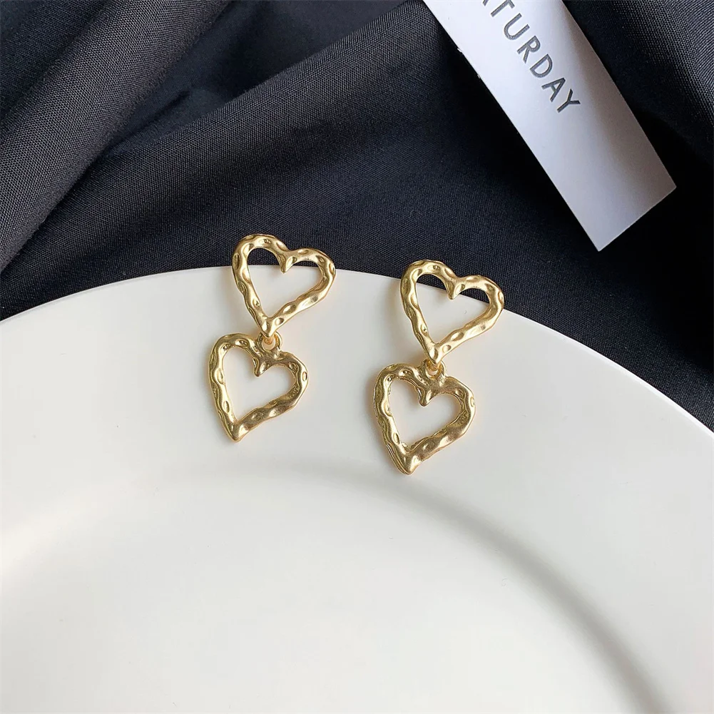 Simple Design Gold Color Hollow Heart Drop Earrings For Women New Brand Fashion Ear Cuff Piercing Dangle Earring Gifts
Simple Design Gold Color Hollow Heart Drop Earrings For Women New Brand Fashion Ear Cuff Piercing Dangle Earring Gifts
