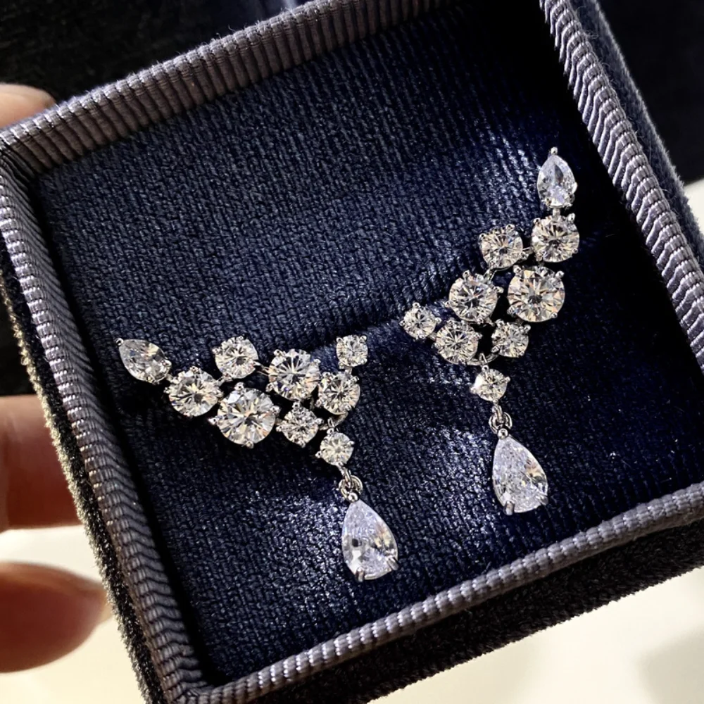 Super sparkling high carbon diamond zirconia white gold wing drop earrings for girls dinner party luxury full diamond earrings 
Super sparkling high carbon diamond zirconia white gold wing drop earrings for girls dinner party luxury full diamond earrings