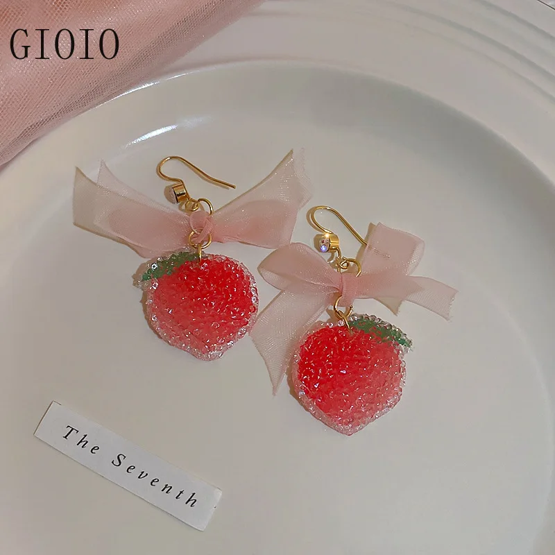 New Sweet and Diamond Mounted Bow Strawberry Soft Candy Earrings Fashion Temperament Design Ear Hook Maiden Fresh Earrings bling
New Sweet and Diamond Mounted Bow Strawberry Soft Candy Earrings Fashion Temperament Design Ear Hook Maiden Fresh Earrings bling