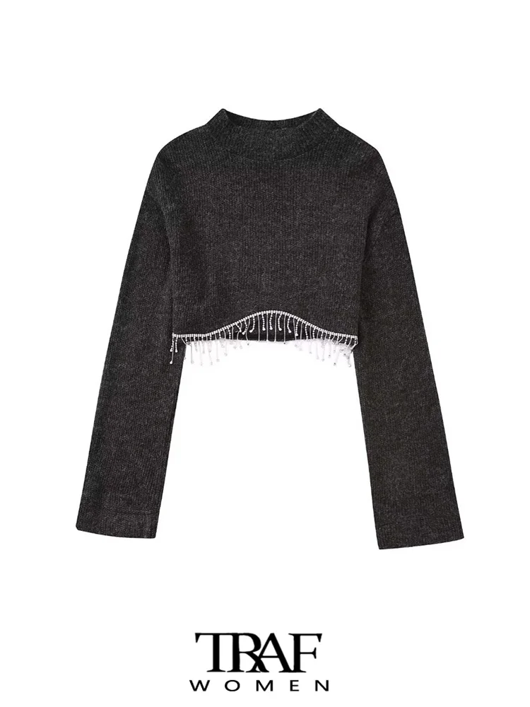 Женский укороченный свитер с бахромой, длинным рукавом и высоким воротником 
Женский укороченный свитер с бахромой, длинным рукавом и высоким воротником