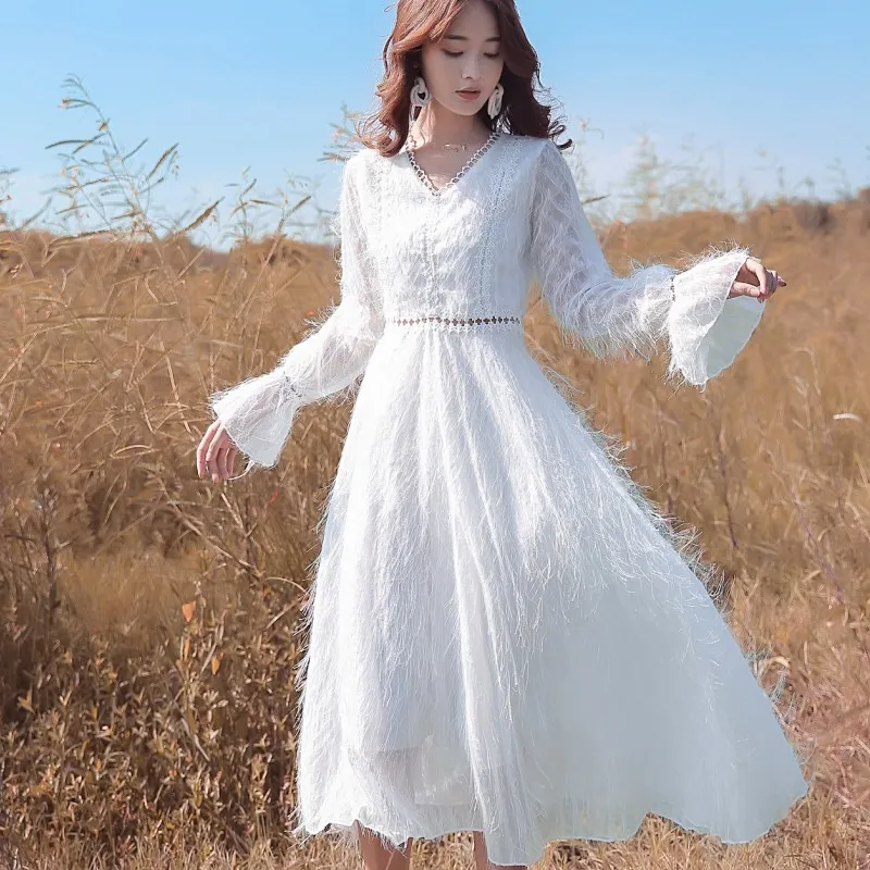 Fashion Tassel Midi Dress 2021 Autumn Women V-Neck Flare Sleeve Vintage Korean High Waist Slim Party Dress Women's Clothing y2k
Fashion Tassel Midi Dress 2021 Autumn Women V-Neck Flare Sleeve Vintage Korean High Waist Slim Party Dress Women's Clothing y2k