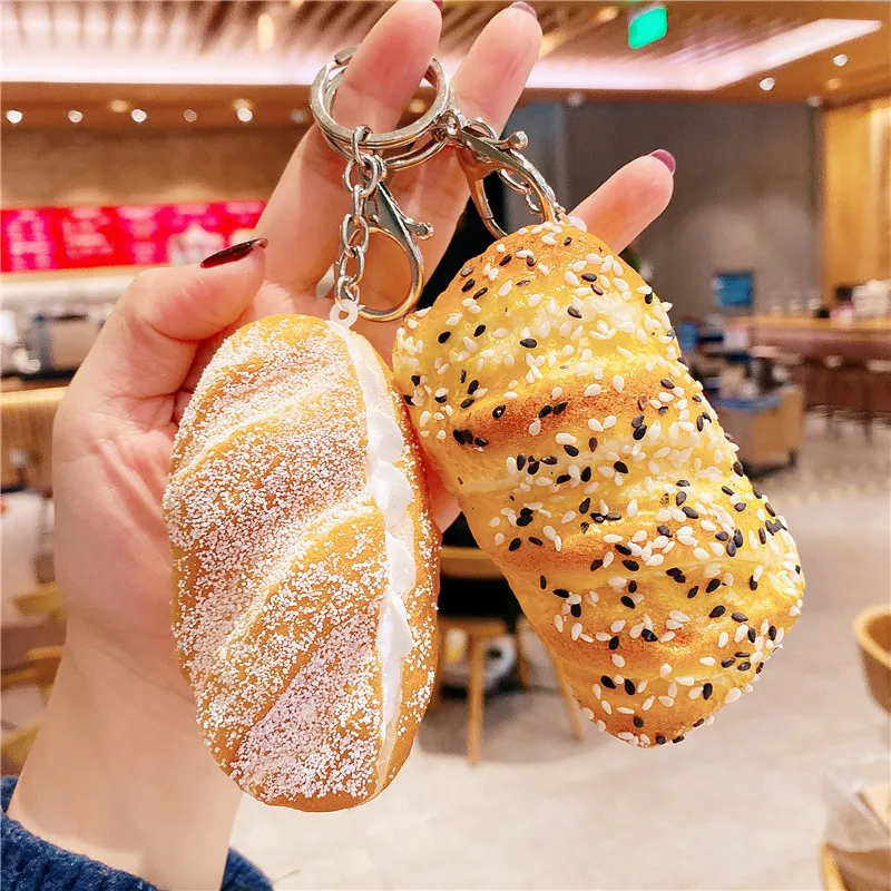 New Bread Key Chain Creative Simulation Coconut Bread Food Decompression Toy Model Car Bag Mobile Phone Pendant Ornaments Gift
New Bread Key Chain Creative Simulation Coconut Bread Food Decompression Toy Model Car Bag Mobile Phone Pendant Ornaments Gift
