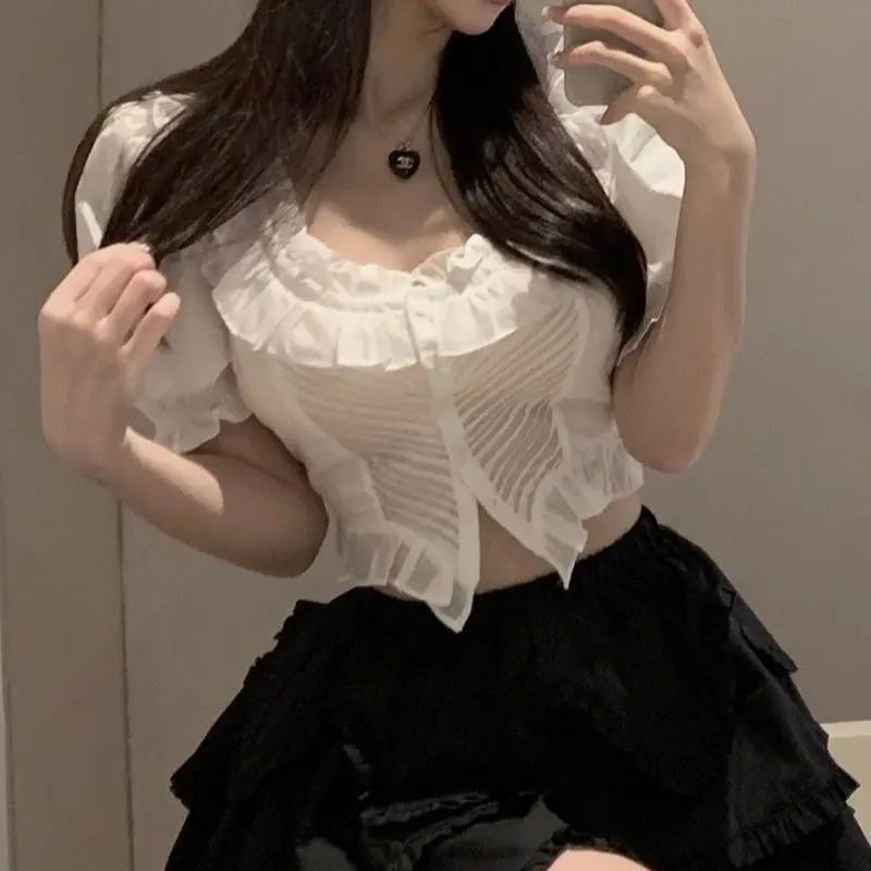 Hong Kong Style Gentle Puff Sleeve Shirt Women's Summer Design Sense Foreign Cinched Waist Irregular Top
Hong Kong Style Gentle Puff Sleeve Shirt Women's Summer Design Sense Foreign Cinched Waist Irregular Top