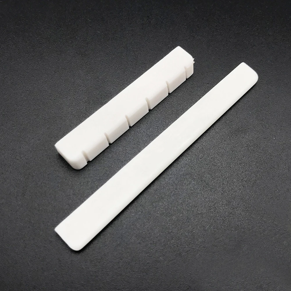 High Quality Guitar Nut Real Bone 52mm 6 String 80mm Bone Bridge Classical Guitar Guitar Saddle Nut Replacement
High Quality Guitar Nut Real Bone 52mm 6 String 80mm Bone Bridge Classical Guitar Guitar Saddle Nut Replacement