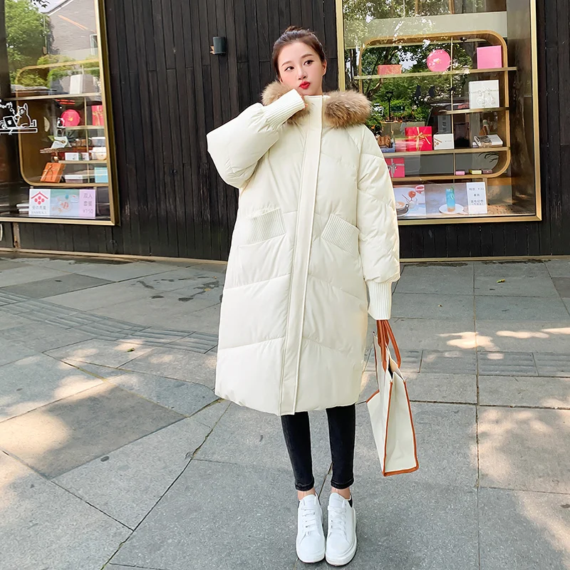 Зимнее длинное пальто с большим меховым воротником и капюшоном для женщин, стеганая верхняя одежда, Женская свободная утепленная куртка из хлопка
Зимнее длинное пальто с большим меховым воротником и капюшоном для женщин, стеганая верхняя одежда, Женская свободная утепленная куртка из хлопка