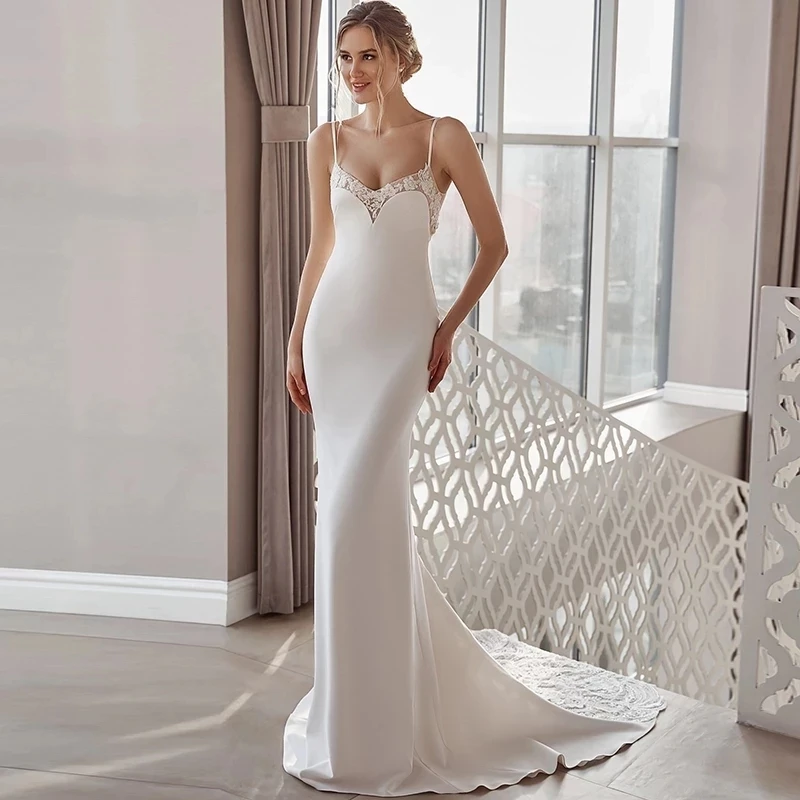 Sexy V-Neck Mermaid Wedding Dress Simple Sleeveless Spaghetti Strap Lace Applique Bridal Gown Backless Off Shoulder Button Train
Sexy V-Neck Mermaid Wedding Dress Simple Sleeveless Spaghetti Strap Lace Applique Bridal Gown Backless Off Shoulder Button Train