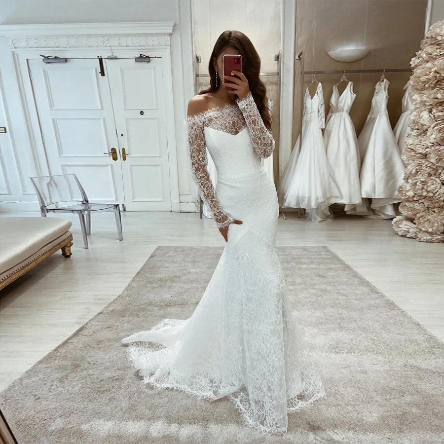 Graceful Off-Shoulder Wedding Dress with Sheer Lace Sleeves and Flowing Mermaid Tail Bridal Dress robe mariee boheme
Graceful Off-Shoulder Wedding Dress with Sheer Lace Sleeves and Flowing Mermaid Tail Bridal Dress robe mariee boheme