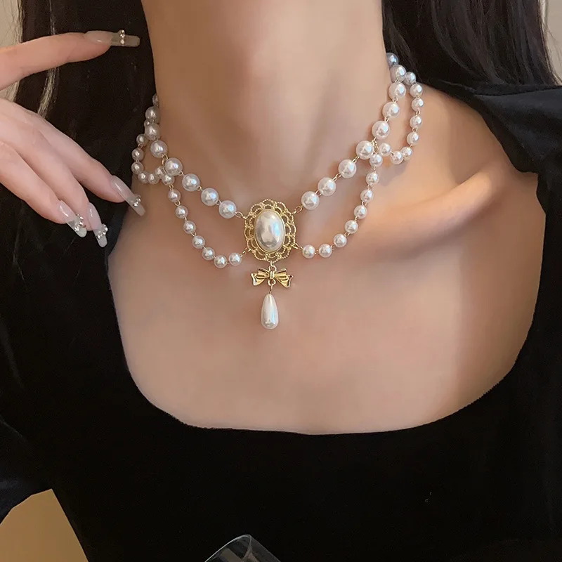 

Gorgeous Imitated Pearl Necklaces Romantic Jewelry Waterdrop Bowknot Pendant Neck Chain Women's Trendy Necklace Charm Jewellery