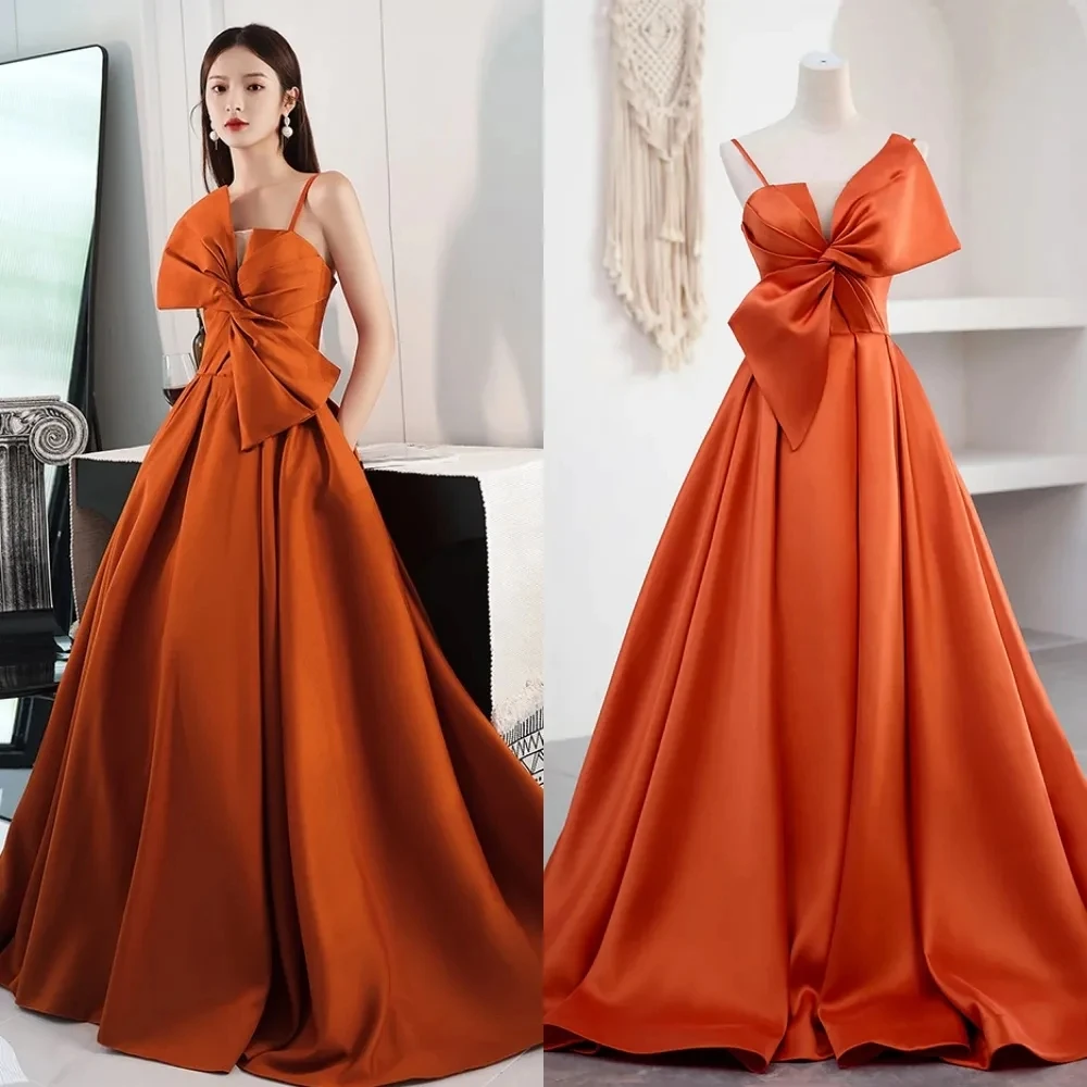 Luxury Satin Orange Prom Dress Spaghetti Straps Pleat Bow Quinceanera Gown Evening Party Dress For Women With Pocket Sweep Train
Luxury Satin Orange Prom Dress Spaghetti Straps Pleat Bow Quinceanera Gown Evening Party Dress For Women With Pocket Sweep Train