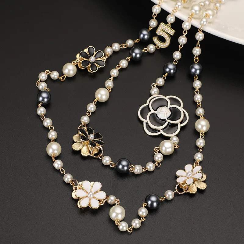 Long Simulated Pearl Necklace for Women Double Layer Camellia Flower Number 5 Pendant Long Necklace Party Jewelry Gifts
Long Simulated Pearl Necklace for Women Double Layer Camellia Flower Number 5 Pendant Long Necklace Party Jewelry Gifts