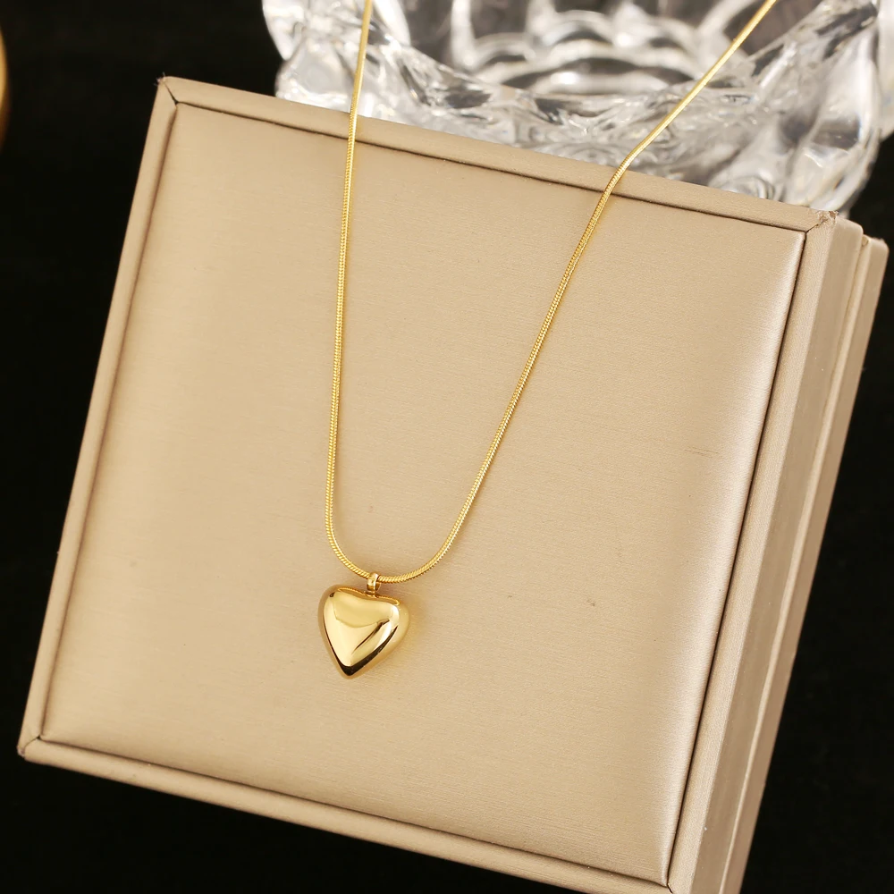 Новое Классическое простое Золотое подвеска в форме сердца из нержавеющей стали, короткое ожерелье для женщин, Модная бижутерия, сексуальн... 
Новое Классическое простое Золотое подвеска в форме сердца из нержавеющей стали, короткое ожерелье для женщин, Модная бижутерия, сексуальн...