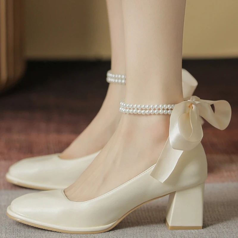 Wedding Shoes for Women Bride Fashion Temperament Bow Simulation Pearls High Heels Square Head Mary Jane Shoes Zapatos De Mujer 
Wedding Shoes for Women Bride Fashion Temperament Bow Simulation Pearls High Heels Square Head Mary Jane Shoes Zapatos De Mujer
