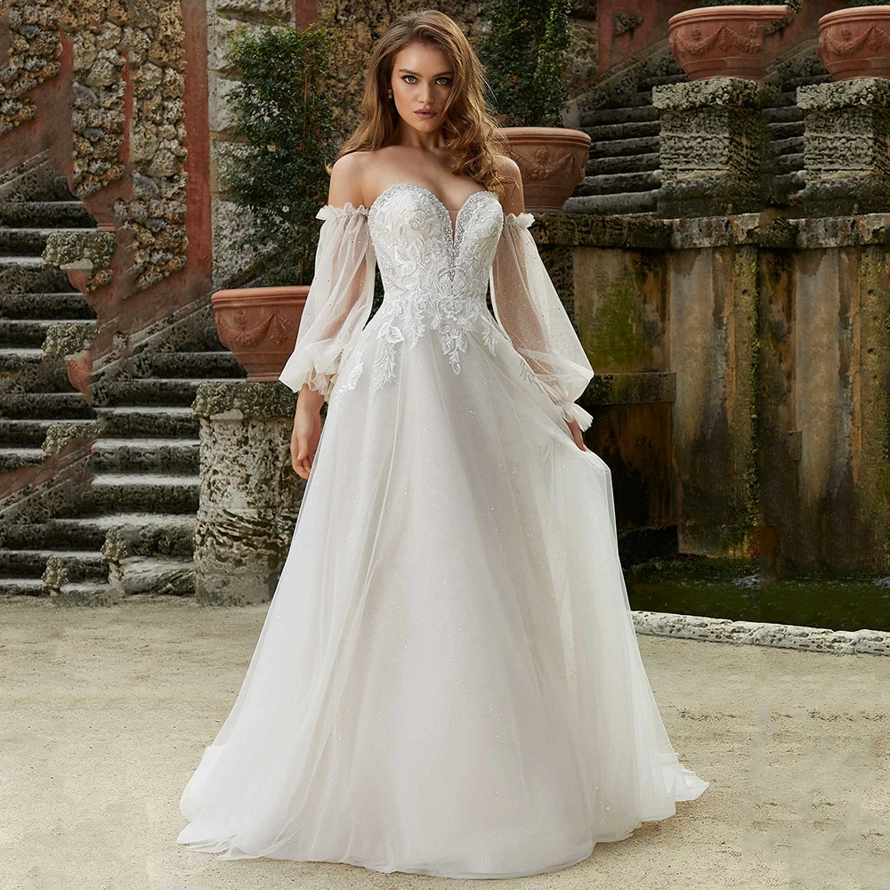 Exquisite A-Line Sweetheart Wedding Dress Vintage Lace Applique Detachable Sleeves Wedding Gowns Backless Glitter Bridal Dress
Exquisite A-Line Sweetheart Wedding Dress Vintage Lace Applique Detachable Sleeves Wedding Gowns Backless Glitter Bridal Dress