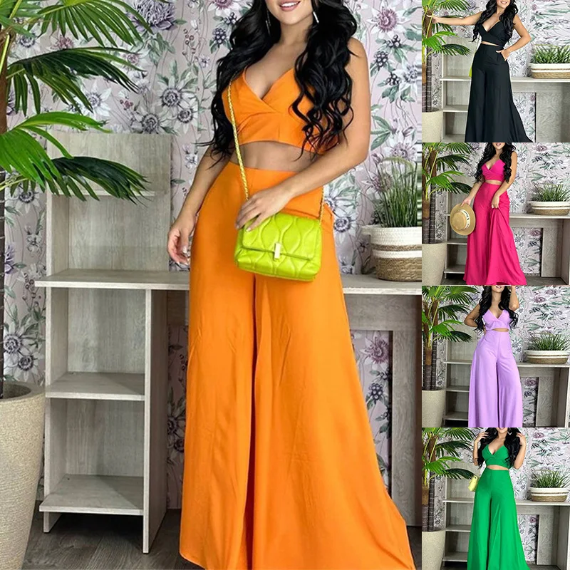 Модный повседневный кроп-топ на бретельках с V-образным вырезом, рубашка с высокой талией и широкими штанинами, одежда, костюм для отпуска, женский летний комплект из двух предметов, наряды
Модный повседневный кроп-топ на бретельках с V-образным вырезом, рубашка с высокой талией и широкими штанинами, одежда, костюм для отпуска, женский летний комплект из двух предметов, наряды