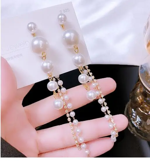 925 silver needle celebrity wind Pearl Korean personality long earring fashion temperament Tassel Earrings female
925 silver needle celebrity wind Pearl Korean personality long earring fashion temperament Tassel Earrings female