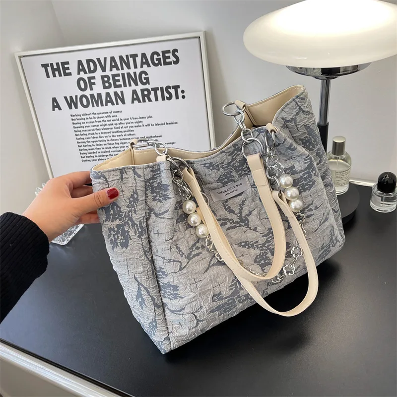High-quality Women's Large-capacity ShoulderBag2022New Printing Women's Bag Fashion Trendy Texture Handbag Pearl Chain Bag Women 
High-quality Women's Large-capacity ShoulderBag2022New Printing Women's Bag Fashion Trendy Texture Handbag Pearl Chain Bag Women