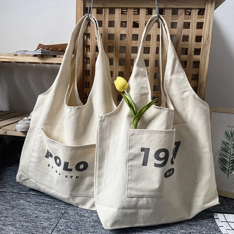Vest bag college student one shoulder canvas bag female Xia Xiaozhong literature and art versatile new portable bag tote bag
Vest bag college student one shoulder canvas bag female Xia Xiaozhong literature and art versatile new portable bag tote bag