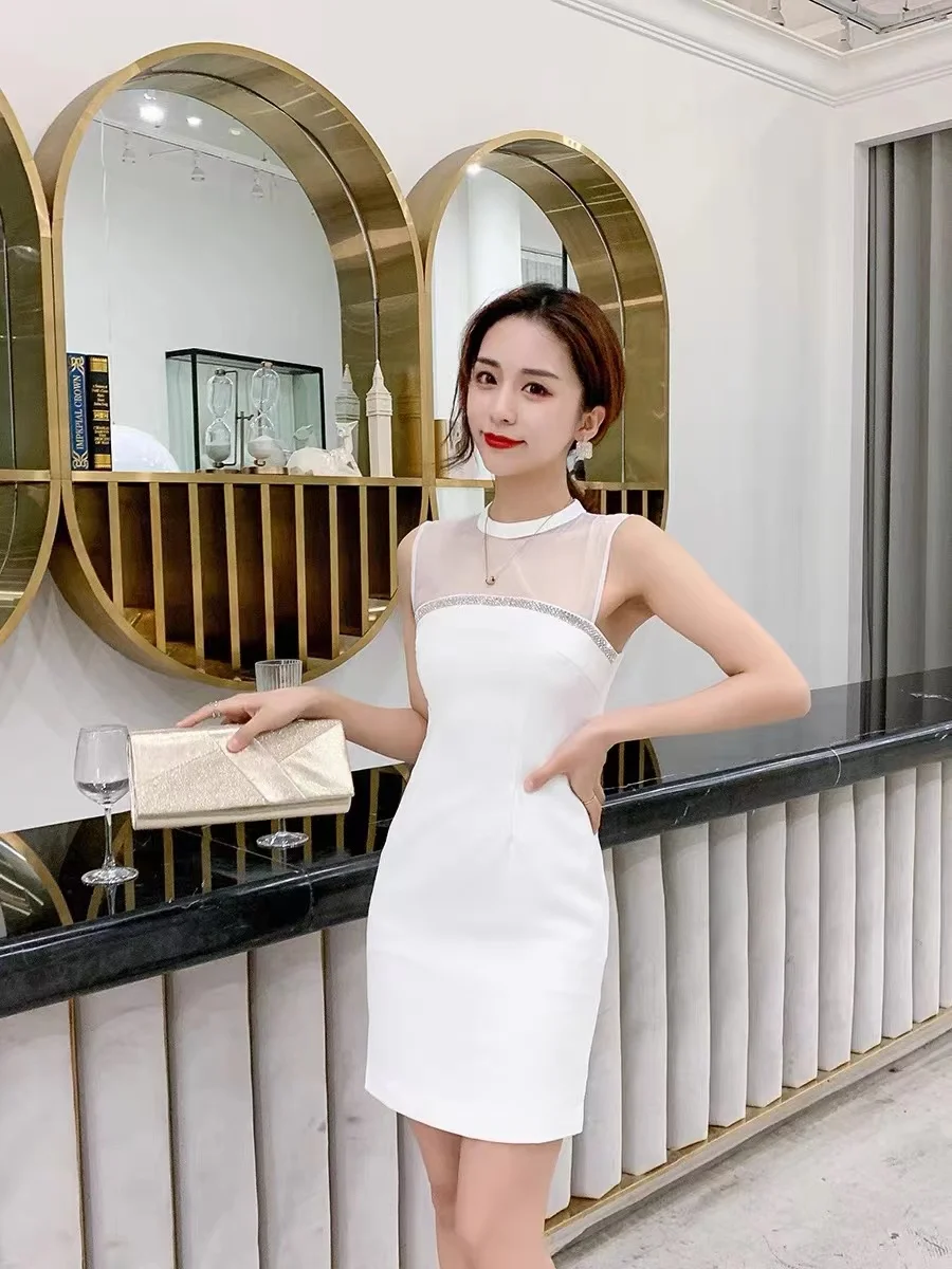 Mesh backless sexy women's dress Elegant sleeveless rhinestones white black mini dresses summer Office Casual Fashion dress
Mesh backless sexy women's dress Elegant sleeveless rhinestones white black mini dresses summer Office Casual Fashion dress