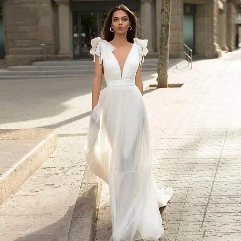 Sexy V Neck A Line Wedding Dress For Women 2022 Shoulders Sleeveless Bridal Dress Backless Chiffon Bridal Gowns Robe De Mariée
Sexy V Neck A Line Wedding Dress For Women 2022 Shoulders Sleeveless Bridal Dress Backless Chiffon Bridal Gowns Robe De Mariée