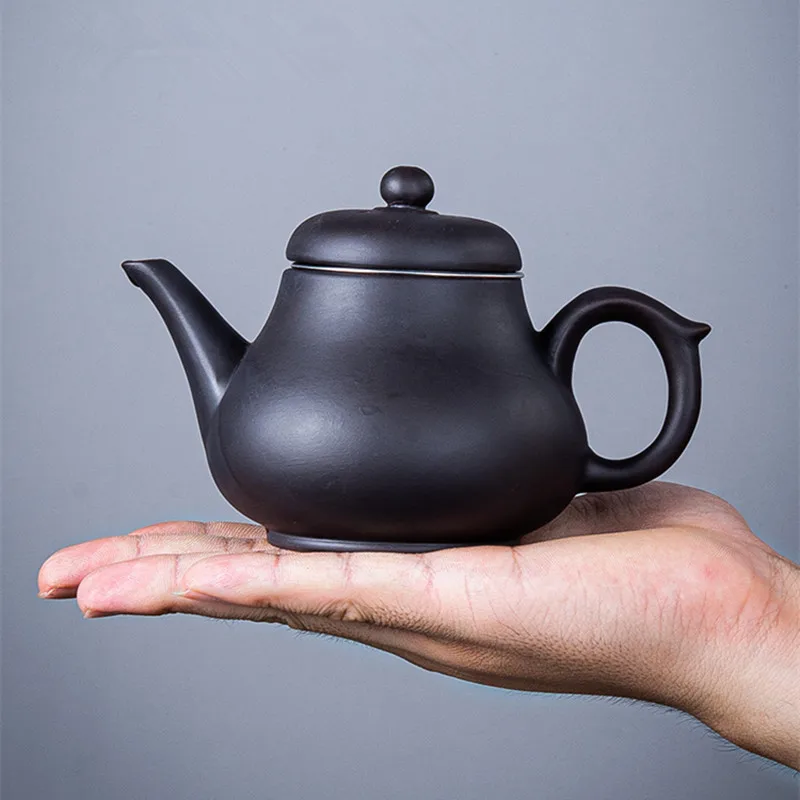 Yixing Purple Clay Teapot Large Capacity Stainless Steel Filter Single Pot Ceramic Teapot Tea Maker Household Kungfu Tea Set
Yixing Purple Clay Teapot Large Capacity Stainless Steel Filter Single Pot Ceramic Teapot Tea Maker Household Kungfu Tea Set