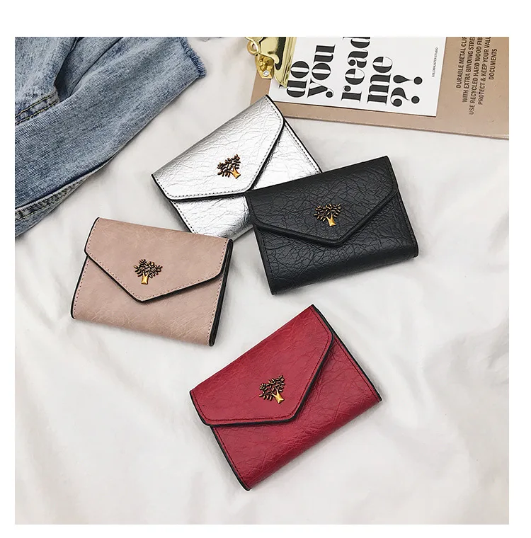 New small tree purse women's short money clip women's card bag zero purse 2023 new bag
New small tree purse women's short money clip women's card bag zero purse 2023 new bag