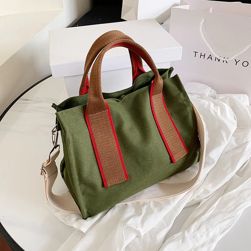 Hand-held canvas women's bag large-capacity shopping bag new fashion literary student messenger shoulder bag
Hand-held canvas women's bag large-capacity shopping bag new fashion literary student messenger shoulder bag