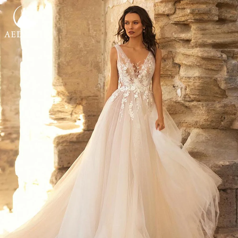 Aedmgh Stunning Beach Wedding Dresses 2023 V-Neck Sleeveless A-Line Court Train Vestido De Novia Elegant Appliques Bridal Gowns
Aedmgh Stunning Beach Wedding Dresses 2023 V-Neck Sleeveless A-Line Court Train Vestido De Novia Elegant Appliques Bridal Gowns