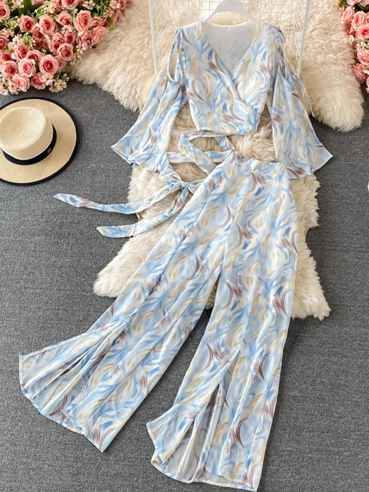 FTLZZ New Summer Women Two Piece Sets Casual V-neck Flare Sleeve Crop Top and Loose Wide Leg Split Pants
FTLZZ New Summer Women Two Piece Sets Casual V-neck Flare Sleeve Crop Top and Loose Wide Leg Split Pants