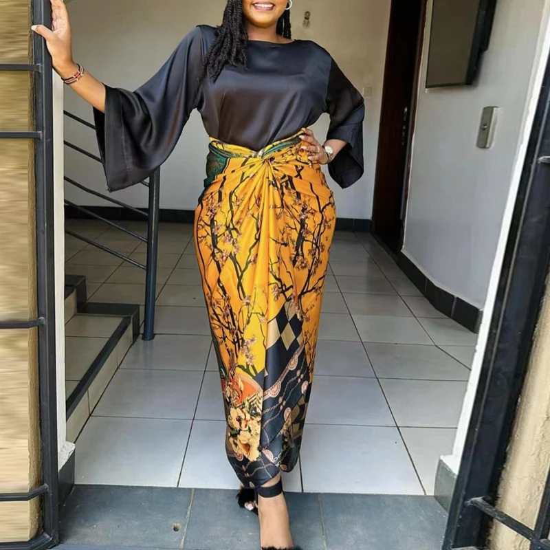 Комплект из двух предметов с Африканским принтом, Женская юбка с круглым вырезом, свободная юбка с расклешенным рукавом и завязкой, костюм из двух предметов, сезон весна-лето, атласное платье, наряды
Комплект из двух предметов с Африканским принтом, Женская юбка с круглым вырезом, свободная юбка с расклешенным рукавом и завязкой, костюм из двух предметов, сезон весна-лето, атласное платье, наряды