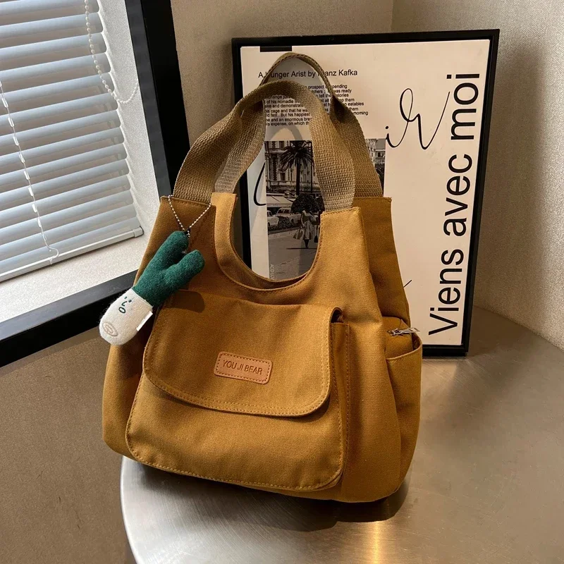 Women Canvas Shoulder Bag Eco Bag Korean Shopper Shoulder Cross Bag Multi Pockets Purses arge Capacity Tote Bag Soft Class Pack
Women Canvas Shoulder Bag Eco Bag Korean Shopper Shoulder Cross Bag Multi Pockets Purses arge Capacity Tote Bag Soft Class Pack
