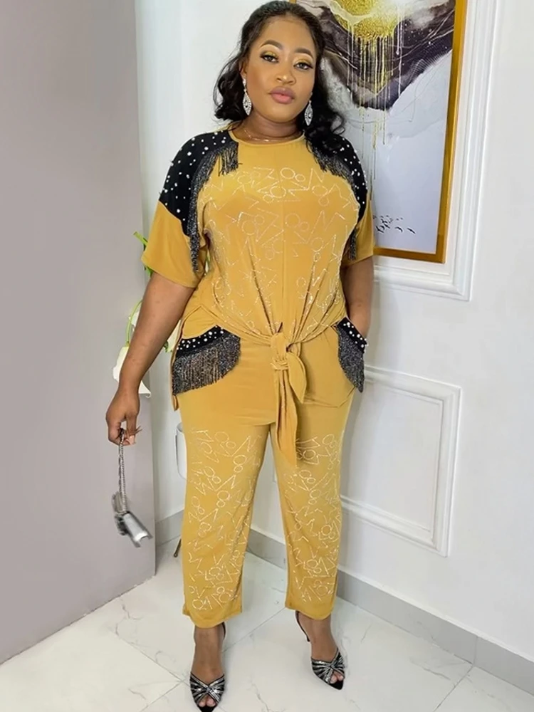 Комплект Дашики женский из 2 предметов, африканская одежда, модный вечерний костюм с коротким рукавом и брюками, лето-осень 
Комплект Дашики женский из 2 предметов, африканская одежда, модный вечерний костюм с коротким рукавом и брюками, лето-осень