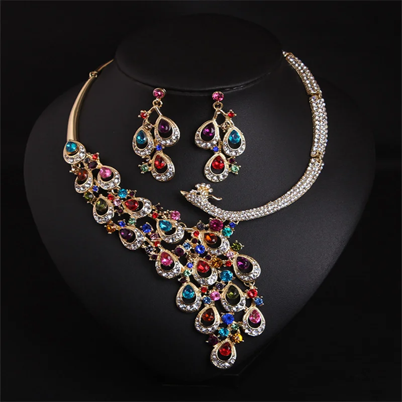 1 set of European and American colored gemstone peacock necklace earrings set bride dress big brand accessories
1 set of European and American colored gemstone peacock necklace earrings set bride dress big brand accessories