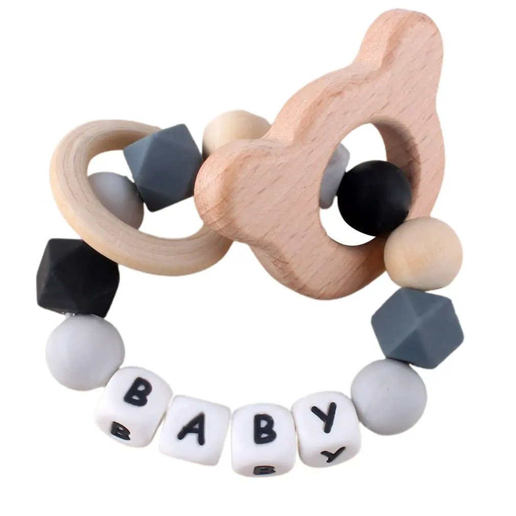 Grasping Activity Shaker Bracelet Teether Ring Chew Bracelet With Natural Organic Beech Wood Teething Rings
Grasping Activity Shaker Bracelet Teether Ring Chew Bracelet With Natural Organic Beech Wood Teething Rings